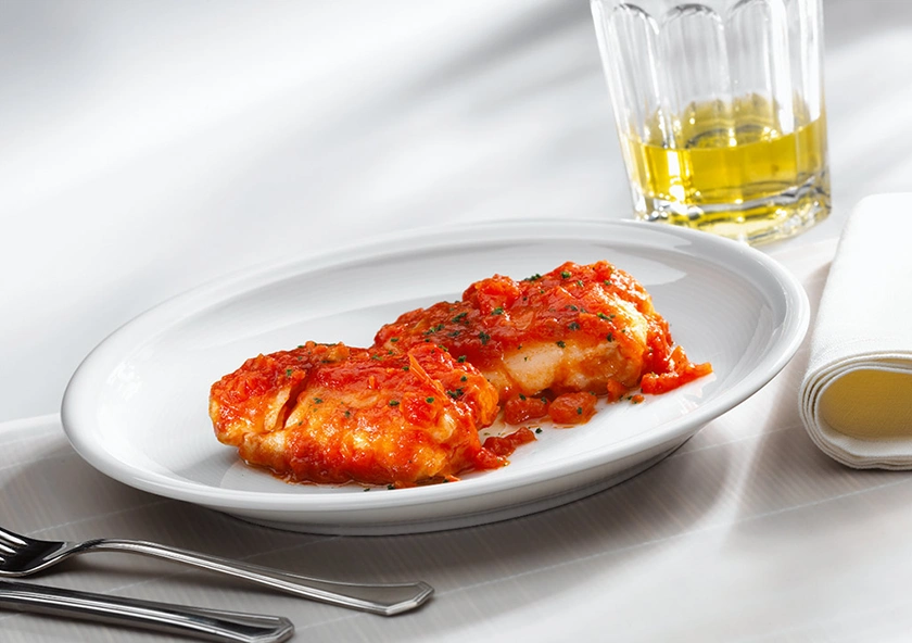Merluza con tomate