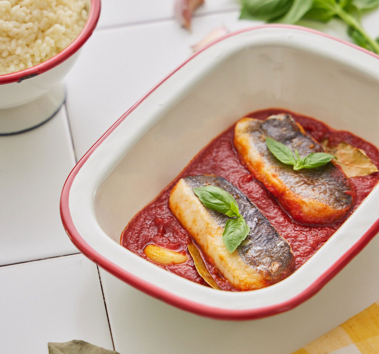 Merluza al horno con tomate